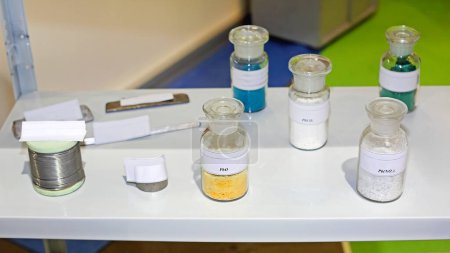 Bottles of Lead Oxide and Lead Nitrate Chemical Elements at Shelf in Laboratory