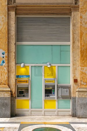 Photo for Naples, Italy - June 22, 2014: Postamat ATM and Night Safety Deposit Box in Window Italian Post Office at Galleria Umberto I Shopping Arcade in City Centre. - Royalty Free Image