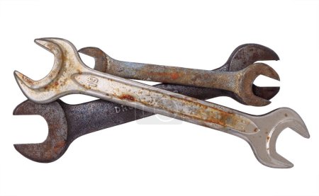 Photo for A small pile of three old, rusted and dirty crescent wrenches isolated on white - Royalty Free Image