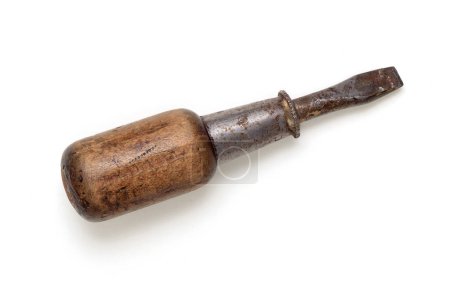 Photo for An old, blemished, well worn and rusting short-bladed screwdriver. Viewed from above, isolated on white with drop shadow - Royalty Free Image