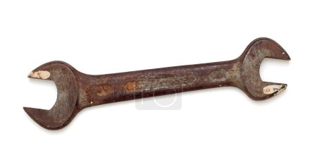 Old rusty and paint splattered crescent wrench. Viewed from above, isolated on white with drop shadow