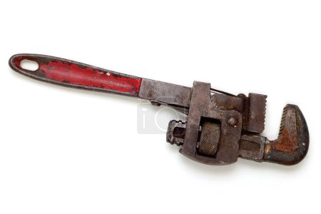 Photo for An old, heavily used and tarnished spanner. Viewed from above, isolated on white with drop shadow - Royalty Free Image
