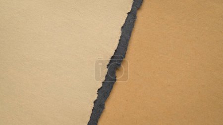 Photo for Divided paper background in earth tones with a copy space - Royalty Free Image