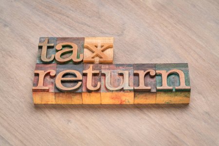 Photo for Tax return  banner - word abstract in vintage letterpress printing blocks, business financial concept - Royalty Free Image