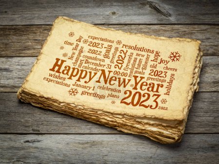 Foto de Tarjeta de felicitación Feliz Año Nuevo 2023 - nube de palabras en un papel retro hecho a mano - Imagen libre de derechos