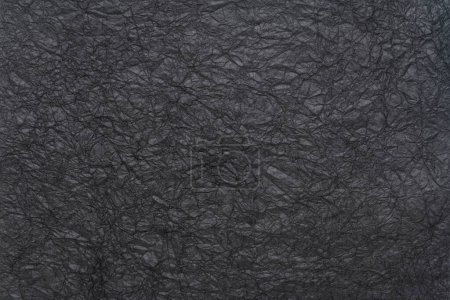 Foto de Fondo y textura de papel de arte arrugado negro - Imagen libre de derechos