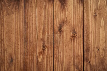 Foto de Fondo y textura de tablero de madera manchada con numerosos nudos - Imagen libre de derechos