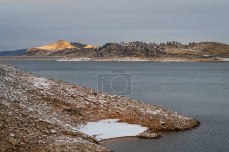 Photo for Calm winter dusk over Horsetooth Reservoir in northern Colorado near Fort Collins, low water level - Royalty Free Image