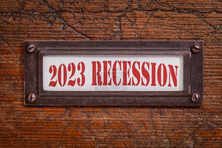 Photo for 2023 recession  - a label on grunge wooden file cabinet. Bear market and financial crisis - Royalty Free Image