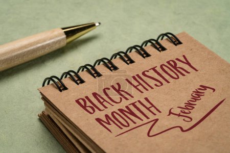 Foto de February - Black History Month, handwriting in a notebook, an annual observance originating in the United States, where it is also known as African-American History Month - Imagen libre de derechos