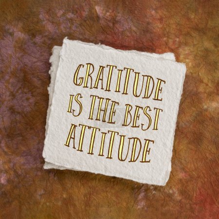 Foto de Gratitude is the best attitude, inspirational handwriting on an art paper, positive mindset and personal development concept - Imagen libre de derechos