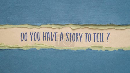 Foto de Do you have a story to tell? Handwriting on an art paper. Storytelling and sharing experience. - Imagen libre de derechos