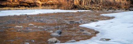 Photo for Poudre River and sandstone cliff near Fort Collins, Colorado, in winter scenery - Royalty Free Image