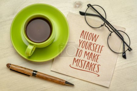 Foto de Allow yourself to make mistakes, inspirational note on napkin, personal development concept - Imagen libre de derechos