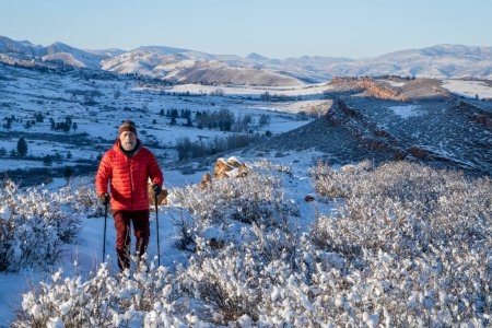 Foto de Senior hiker in winter scenery of Rocky Mountains foothills in northern Colorado, Lory State Park - Imagen libre de derechos