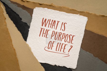 Téléchargez les photos : What is the purpose of life? Philosophical question handwritten on an art paper. - en image libre de droit