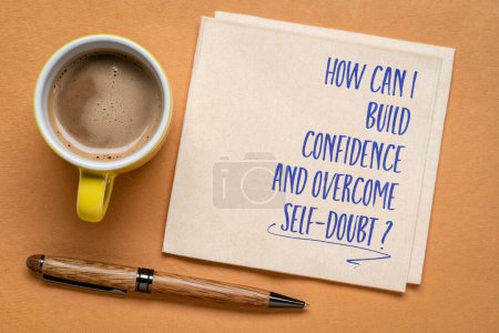 Photo for How can I build confidence and overcome self-doubt? Inspirational question on a napkin. Personal development and self help concept. - Royalty Free Image