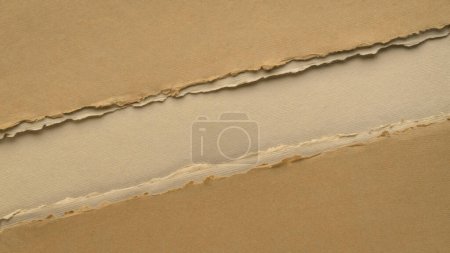 Téléchargez les photos : Paper abstract in earth tones with a copy space, blank web banner - en image libre de droit