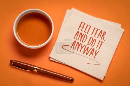 Photo for Feel fear and do it anyway - inspiration handwriting, challenge, courage and personal development concept - Royalty Free Image