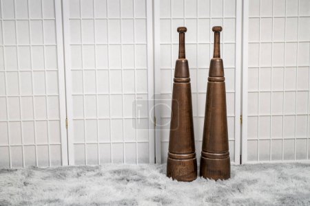 Photo for A couple of wooden Persian meels in a home gym, functional fitness concept - Royalty Free Image