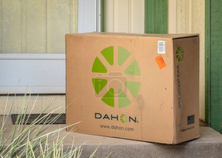 Photo for Fort Collins, CO, USA - May 3, 2023: Home delivery of a big box containing a new folding bike from Dahon. - Royalty Free Image