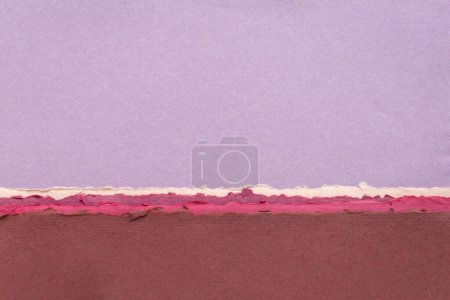 Foto de Paisaje abstracto en tonos pastel rosa y púrpura - una colección de papeles de trapo hechos a mano - Imagen libre de derechos