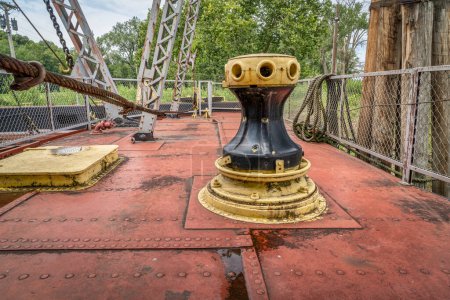 Photo for Capstan and other gear on a deck of a vintage sidewheeler river dredge - Royalty Free Image