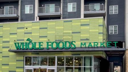 Photo for Kansas City, MO, USA - August 3, 2023: Whole Foods Market with stores in the USA, Canada, and the UK, is an American foods supermarket chain specializing in natural and organic foods. - Royalty Free Image
