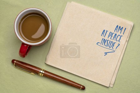 Photo for Am I at peace inside? Self reflection question on a napkin with coffee. Mindfulness and personal development concept. - Royalty Free Image