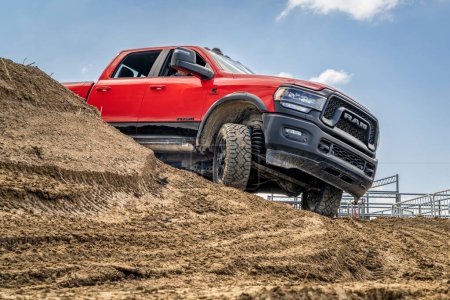 Photo for Loveland, CO, USA - August 26, 2023: RAM Rebel truck on a muddy training off-road trail course. - Royalty Free Image