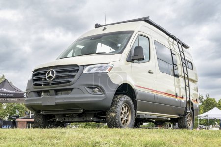 Photo for Loveland, CO, USA - August 25, 2023: Storyteller Overland Mode, 4x4 camper van on Mercedes Sprinter chassis at a busy campground. - Royalty Free Image