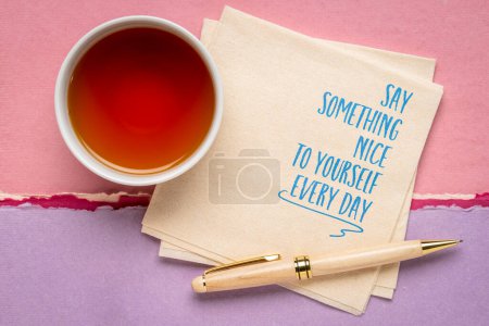 Photo for Say something nice to yourself every day - inspirational reminder note on a napkin, self care and positive self talk concept - Royalty Free Image