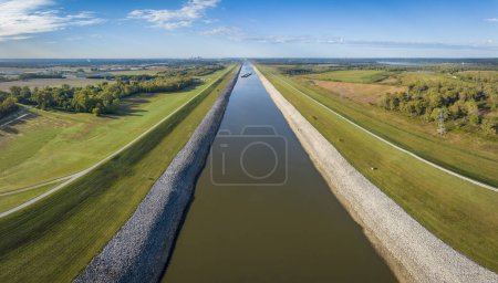 Photo for Chain of Rock Bypass Canal of Mississippi River above St Louis, aerial view with distant barges - Royalty Free Image