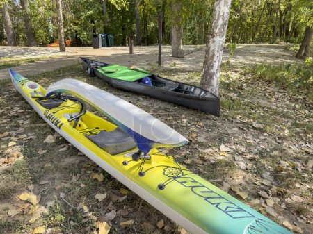 Photo for Jefferson City, MO, USA - October 7, 2023: Huki, high performance outrigger canoe prepared for transportation at Wilson Serenity Point (Noren River Access) after a race on the the Missouri River. - Royalty Free Image