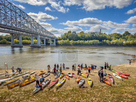 Photo for Jefferson City, MO, USA - October 7, 2023: Paddlers with kayaks and canoes at race finish on a beach of the Missouri River at Wilson Serenity Point (Noren River Access). - Royalty Free Image