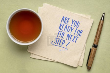 Photo for Are you ready for the next step? Self reflection question on a napkin with tea. Personal development or career concept. - Royalty Free Image