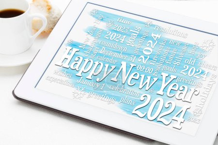 Téléchargez les photos : Bonne année 2024 - nuage de mots sur une tablette numérique avec une tasse de café - carte de voeux - en image libre de droit