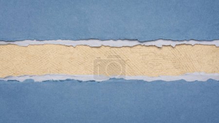 Foto de Paper abstract in blue and beige with a copy space, blank web banner - Imagen libre de derechos