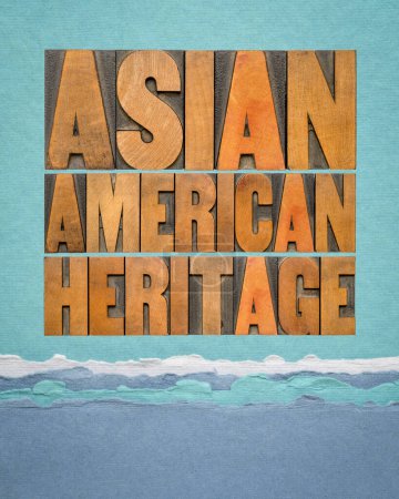 Téléchargez les photos : Asian American Heritage - mot abstrait en bois de typographie vintage contre papier d'art dans les tons bleus, rappel de l'événement culturel - en image libre de droit