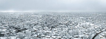 Photo for Winter morning over city of Fort Collins and Front Range of Rocky Mountains in northern Colorado after snowstorm, aerial view - Royalty Free Image