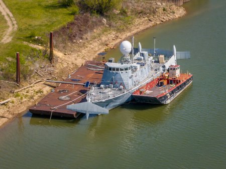 Photo for Gasconade, MO, USA - April 21, 2024: USS Aries (PHM-5), decommissioned Navy hydrofoil ship in an old boatyard at Confluence of Missouri and Gasconade Rivers. - Royalty Free Image