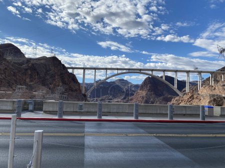 Photo for Photo of Mike O'Callaghan-Pat Tillman Memorial Bridge, an arch bridge that spans Colorado River between Arizona and Nevada located within the Lake Mead National Recreation Area in the United States. - Royalty Free Image