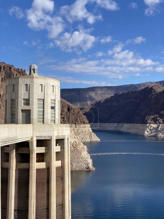 Photo of the Hoover Dam, a concrete arch gravity dam in the Black Canyon of the Colorado River in Boulder City, Clark County on the border between Nevada and Arizona, United States of America USA.
