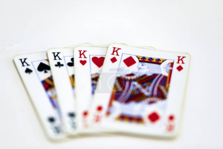 Foto de 4 Reyes en una fila - Jugar a las cartas, Aislado en blanco - Imagen libre de derechos