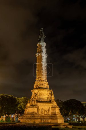 The Albuquerque monument with bronze statue of Afonso de Albuquerque at night in Belem, Lisbon, Portugal.