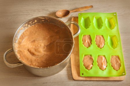Photo for Cooking homemade marshmallows. Casserole with applesauce and molds. Flat lay - Royalty Free Image