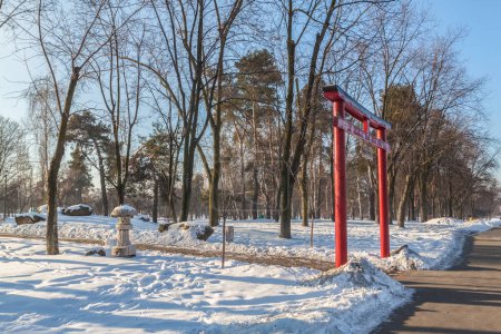 Photo for Red torii in a Japanese garden in Kiev in the winter - Royalty Free Image