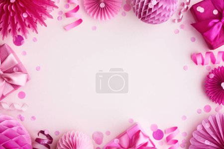 Photo for Pink party background border frame with birthday gifts and decorations - Royalty Free Image