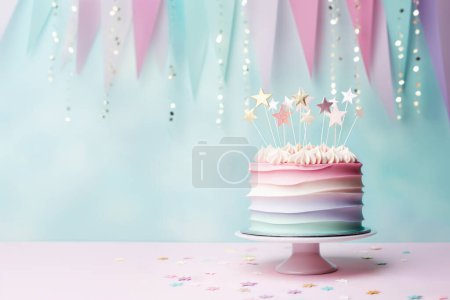 Photo for Beautiful pastel rainbow colored birthday cake with celebration bunting and gold star cake toppers - Royalty Free Image
