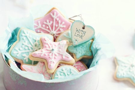 Photo for Christmas cookie gift box filled with decorated snowflake cookies - Royalty Free Image